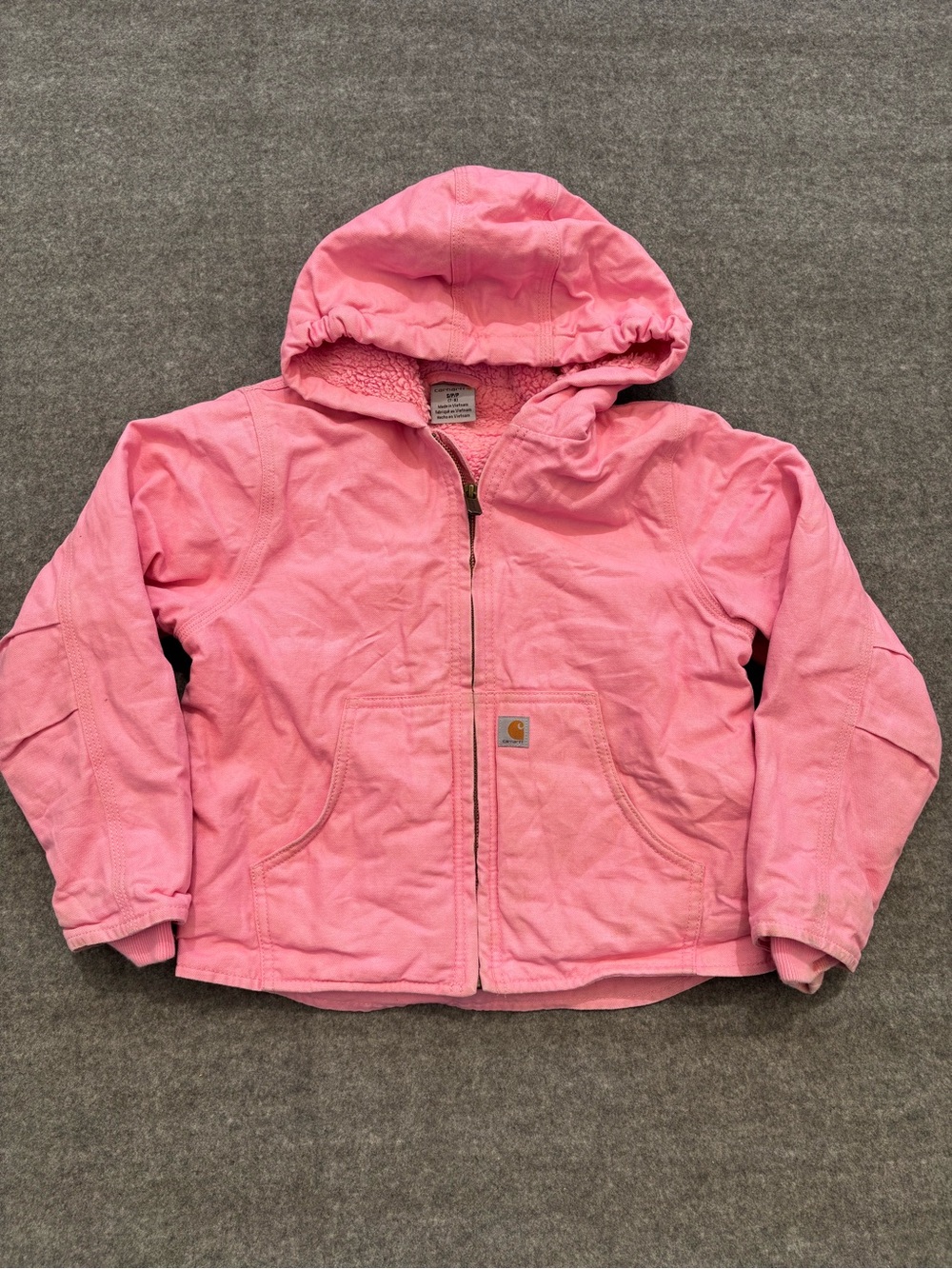 Carhartt pink jacket with hood and fleece lining. Size:Small 7/8